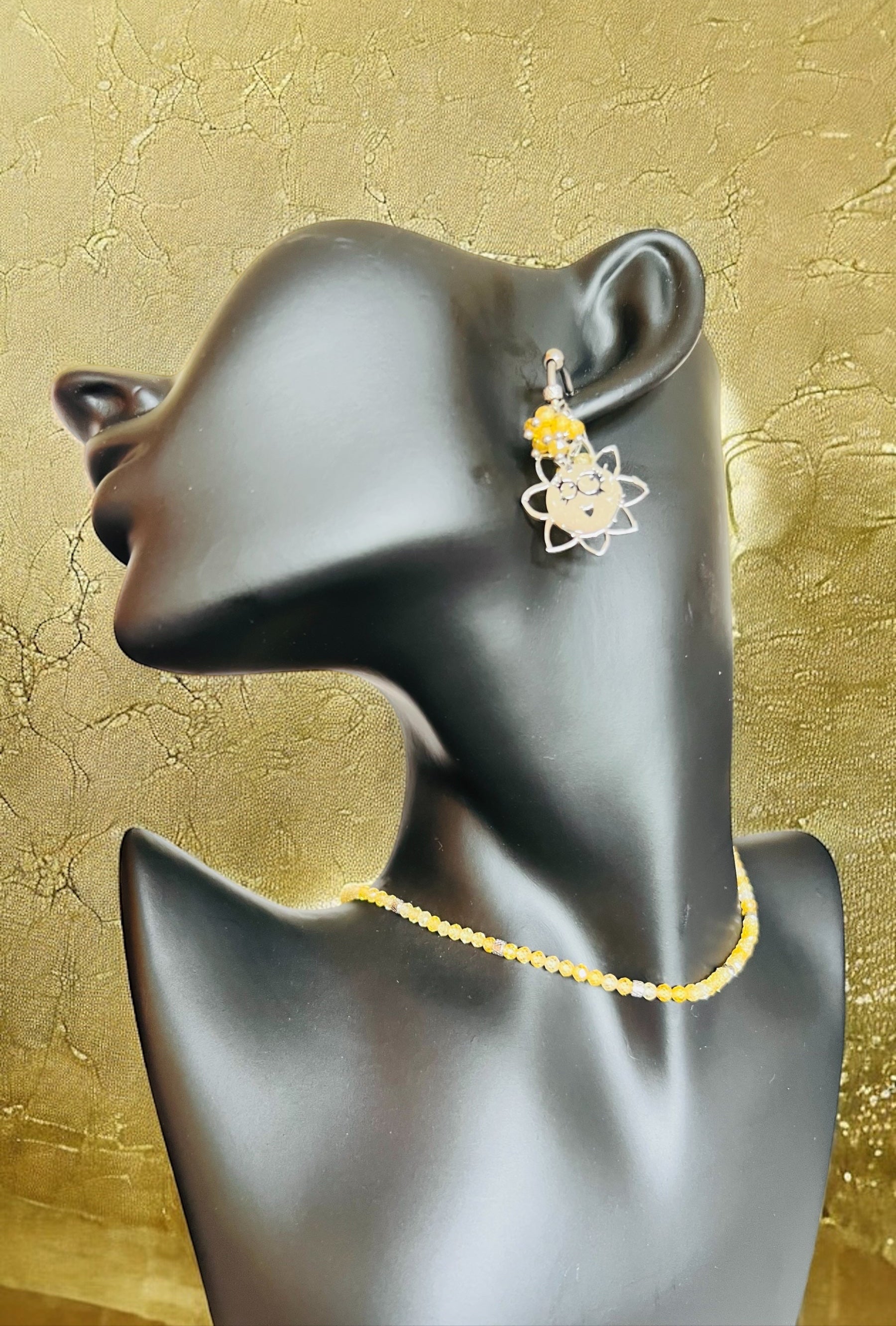 Mono orecchino in acciaio e zirconi