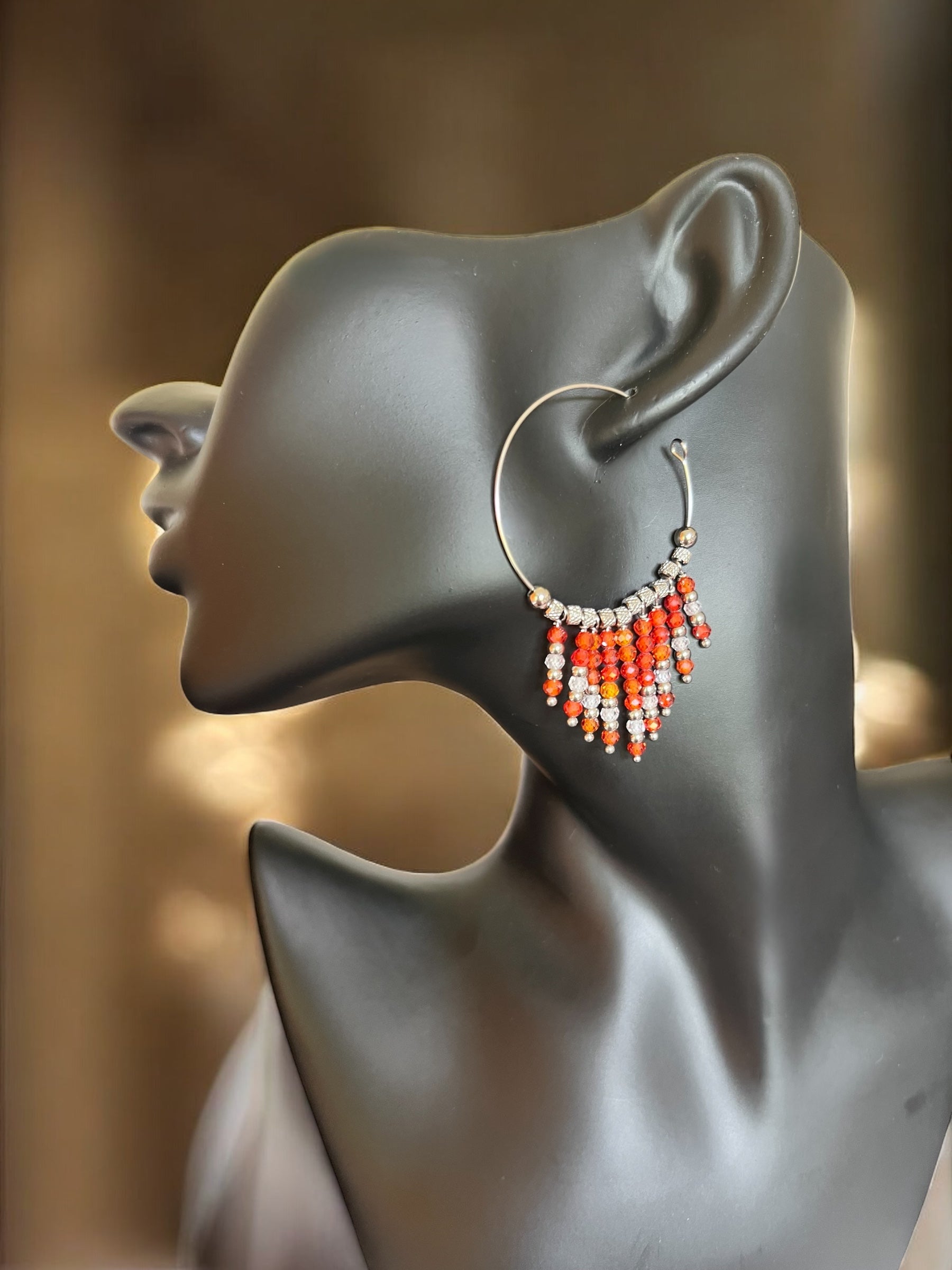 Mono orecchino in acciaio e zirconi