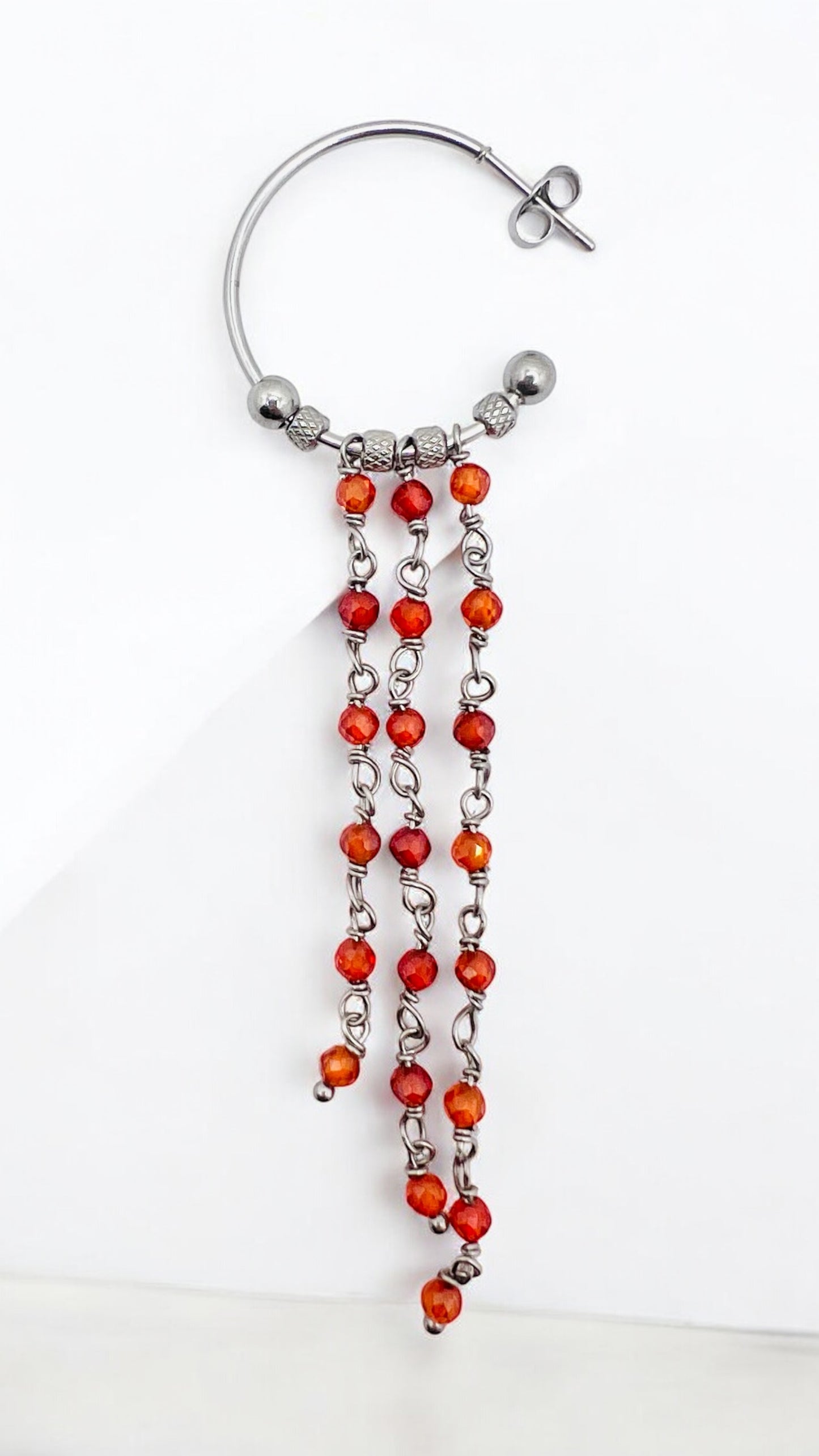 Orecchini in acciaio e zirconi arancioni