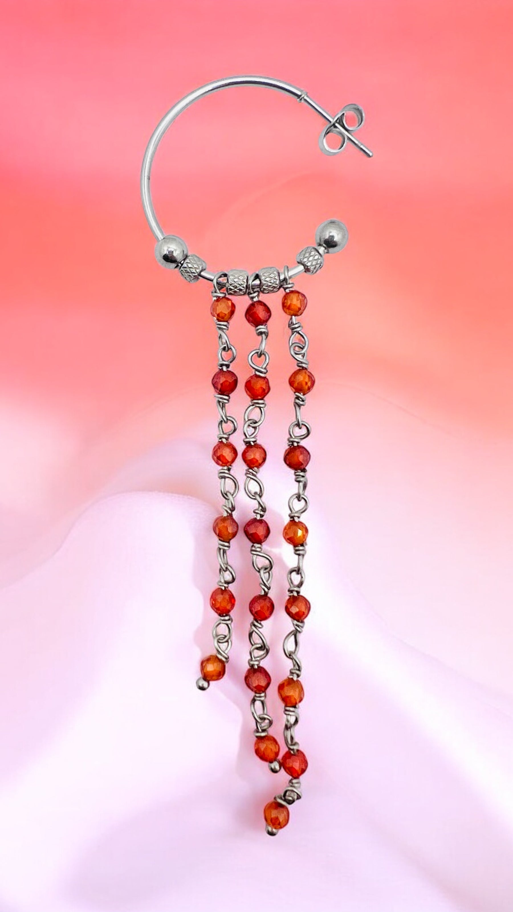 Orecchini in acciaio e zirconi arancioni