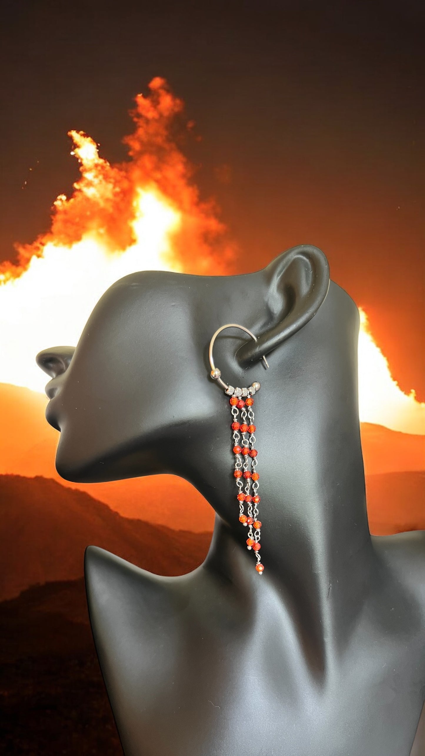 Orecchini in acciaio e zirconi arancioni