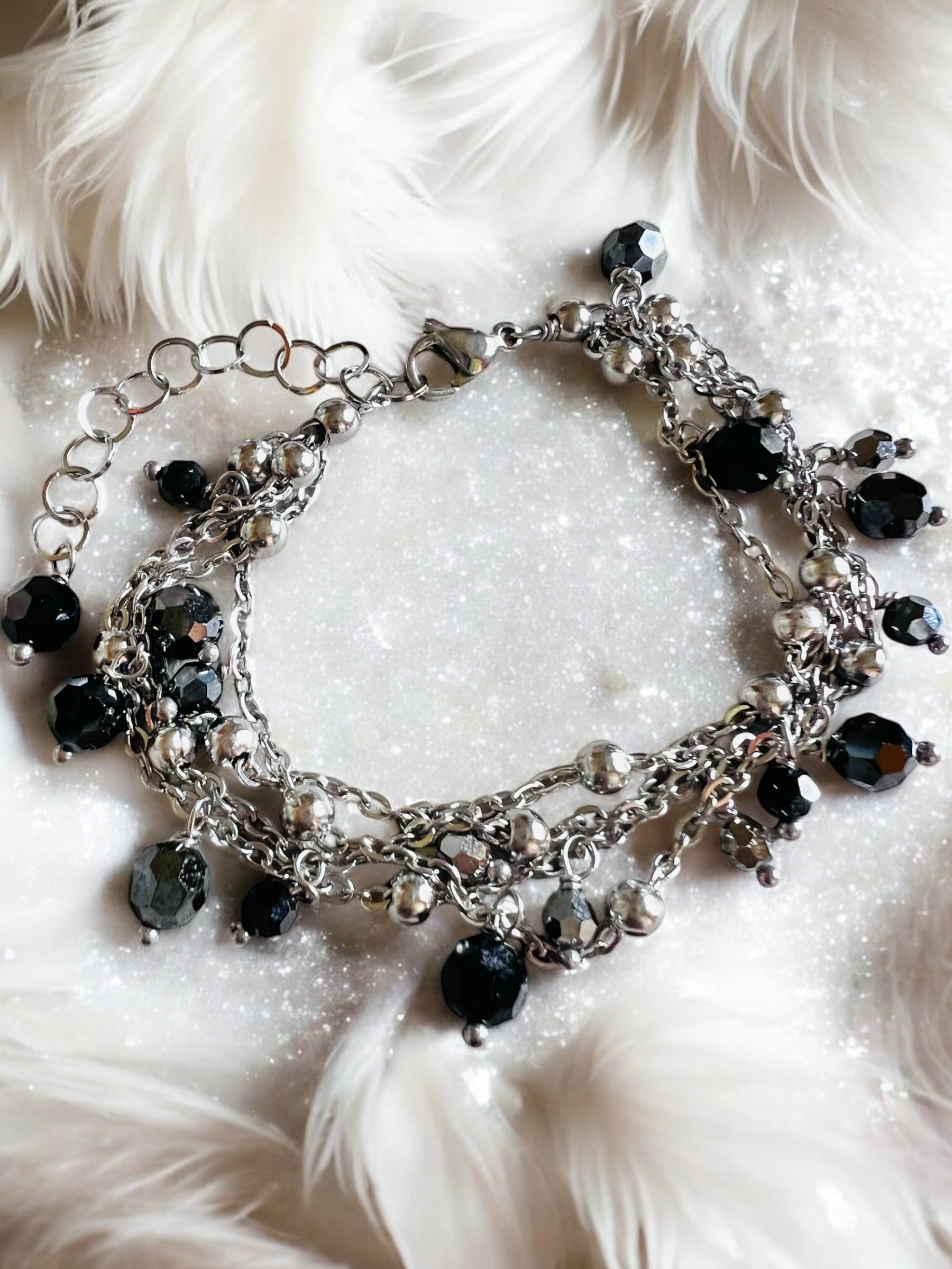 Bracciale multi strano in acciaio e cristalli Swarovski
