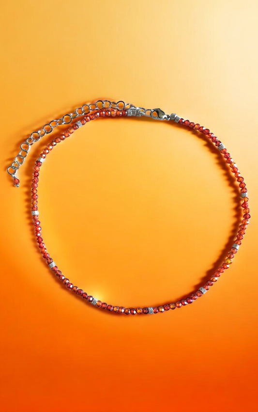 Girocollo in acciaio e zirconi arancioni