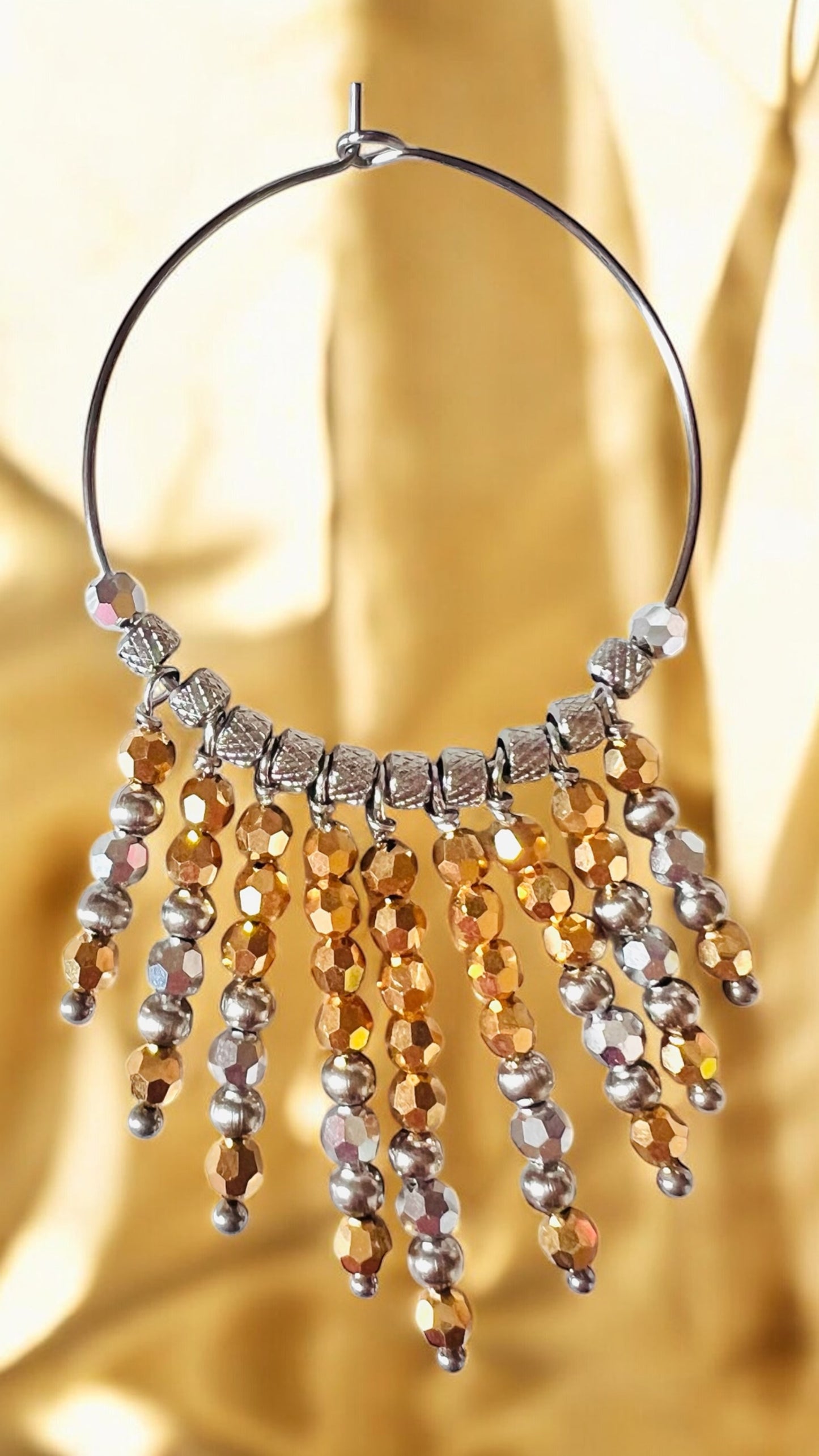 Mono orecchino in acciaio e cristalli