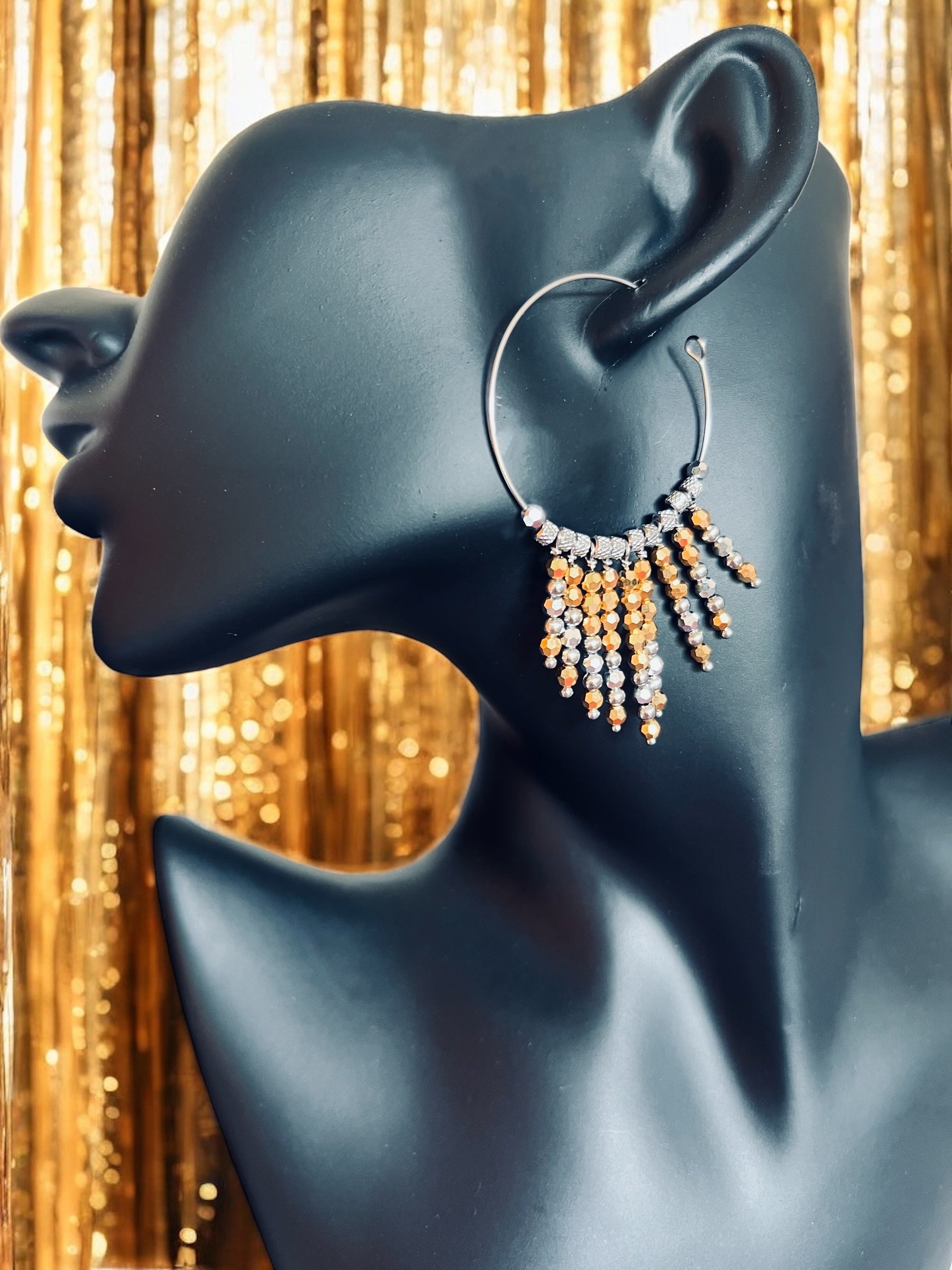 Mono orecchino in acciaio e cristalli