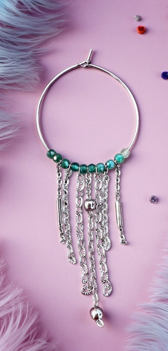 Mono orecchino in acciaio e zirconi