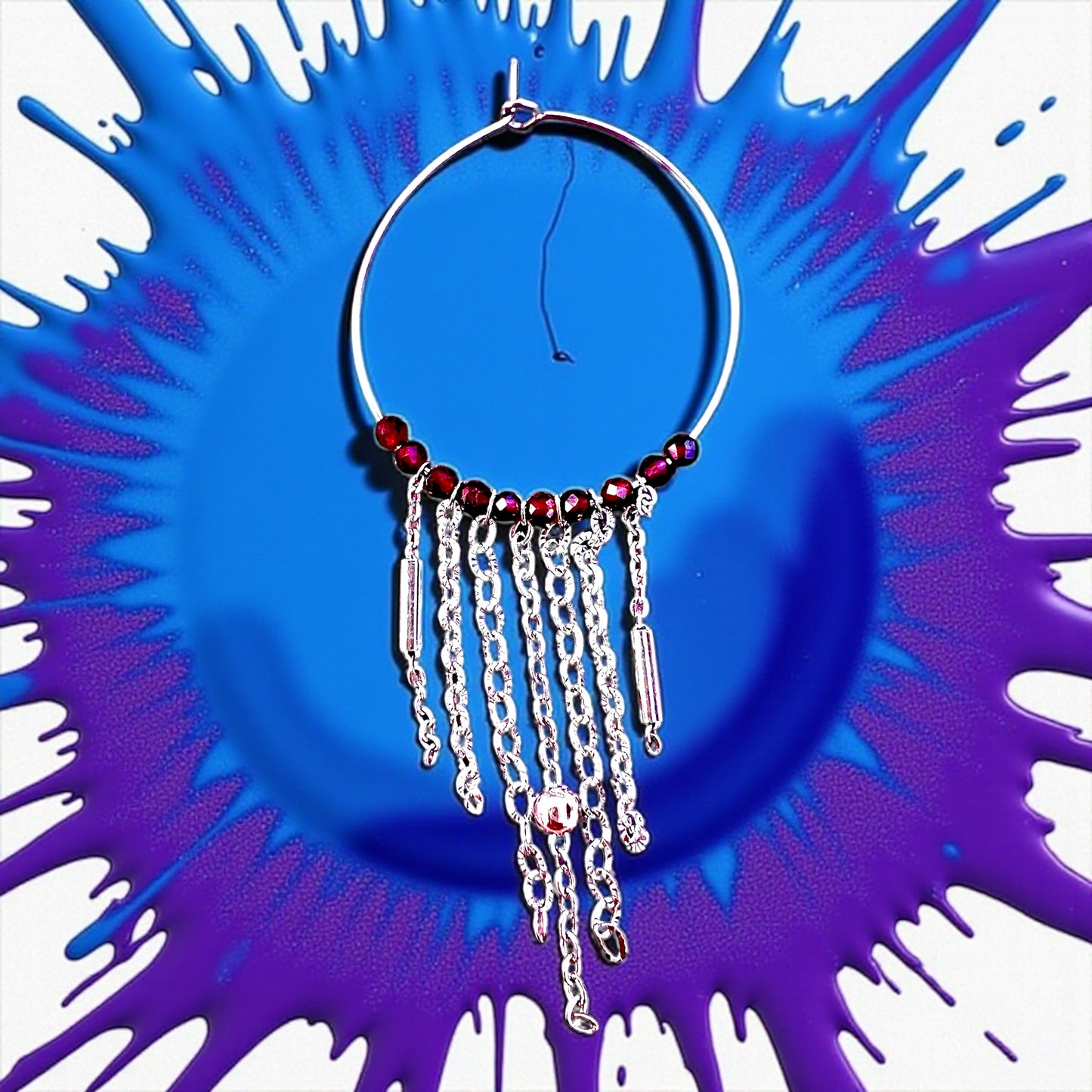 Mono orecchino in acciaio e granate