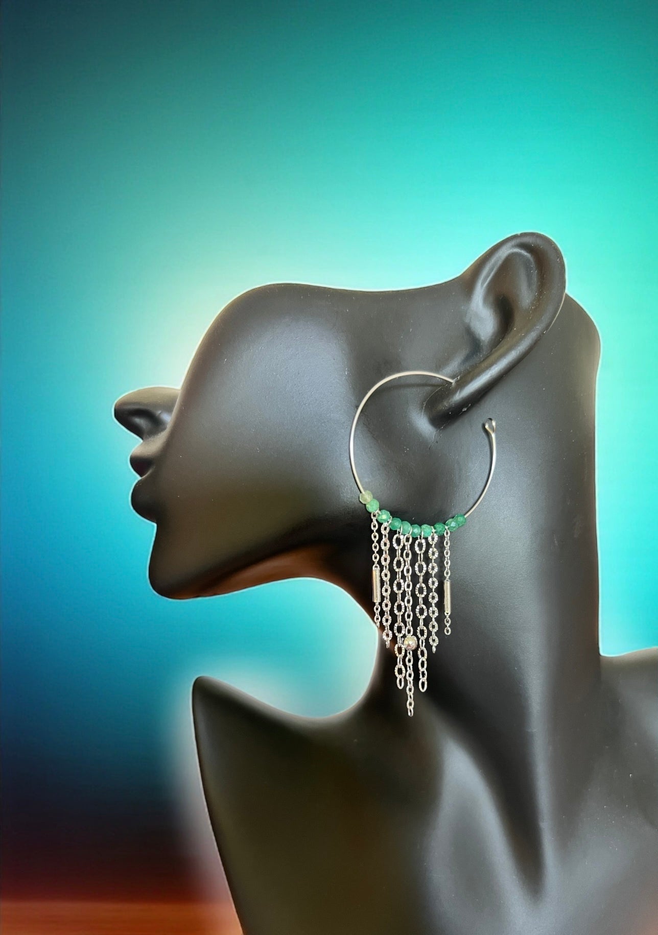 Mono orecchino in acciaio e zirconi