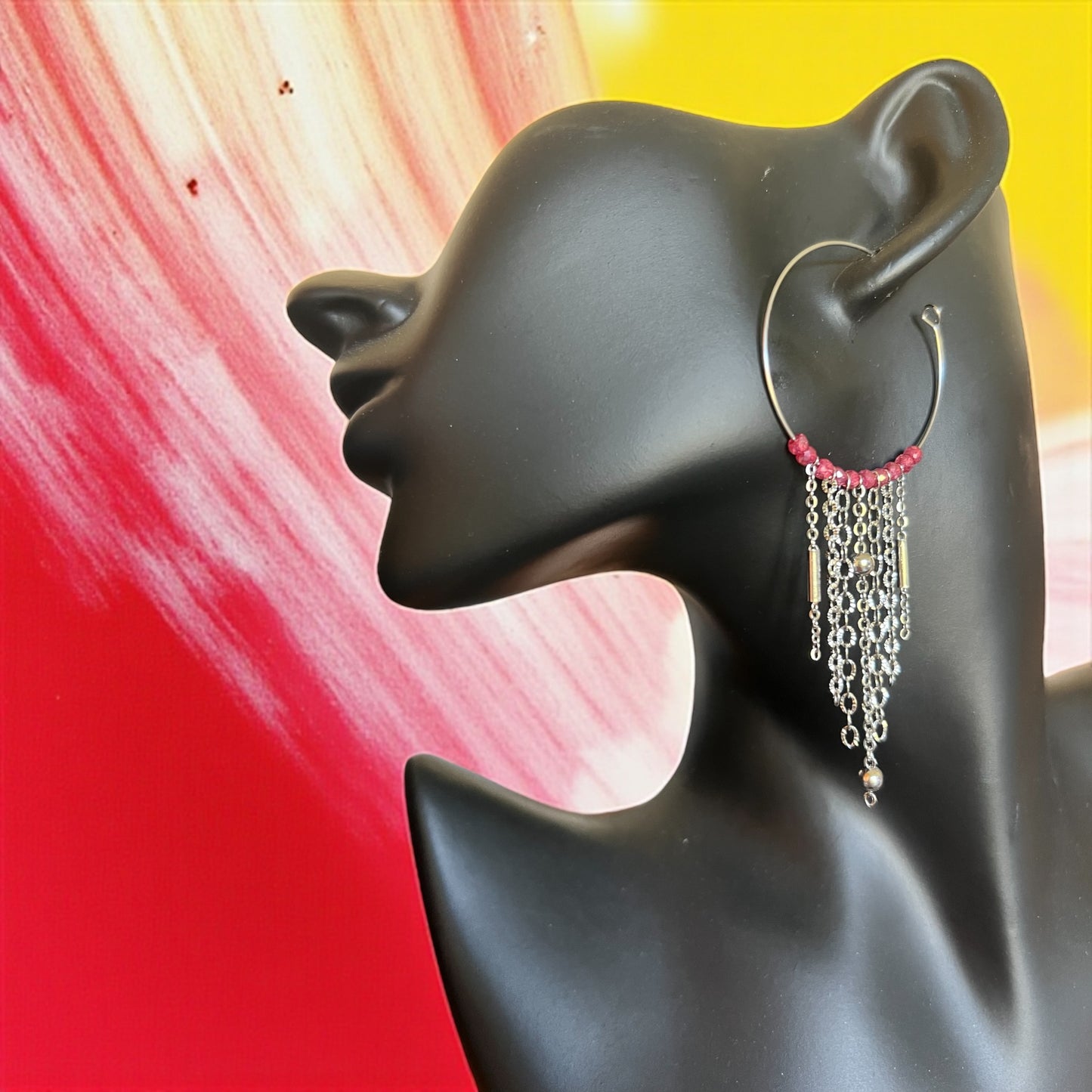 Mono orecchino in acciaio e zirconi