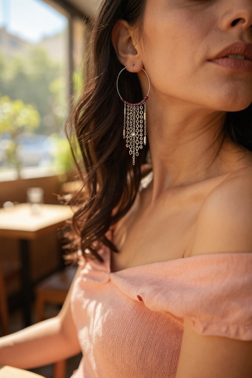 Mono orecchino in acciaio e granate