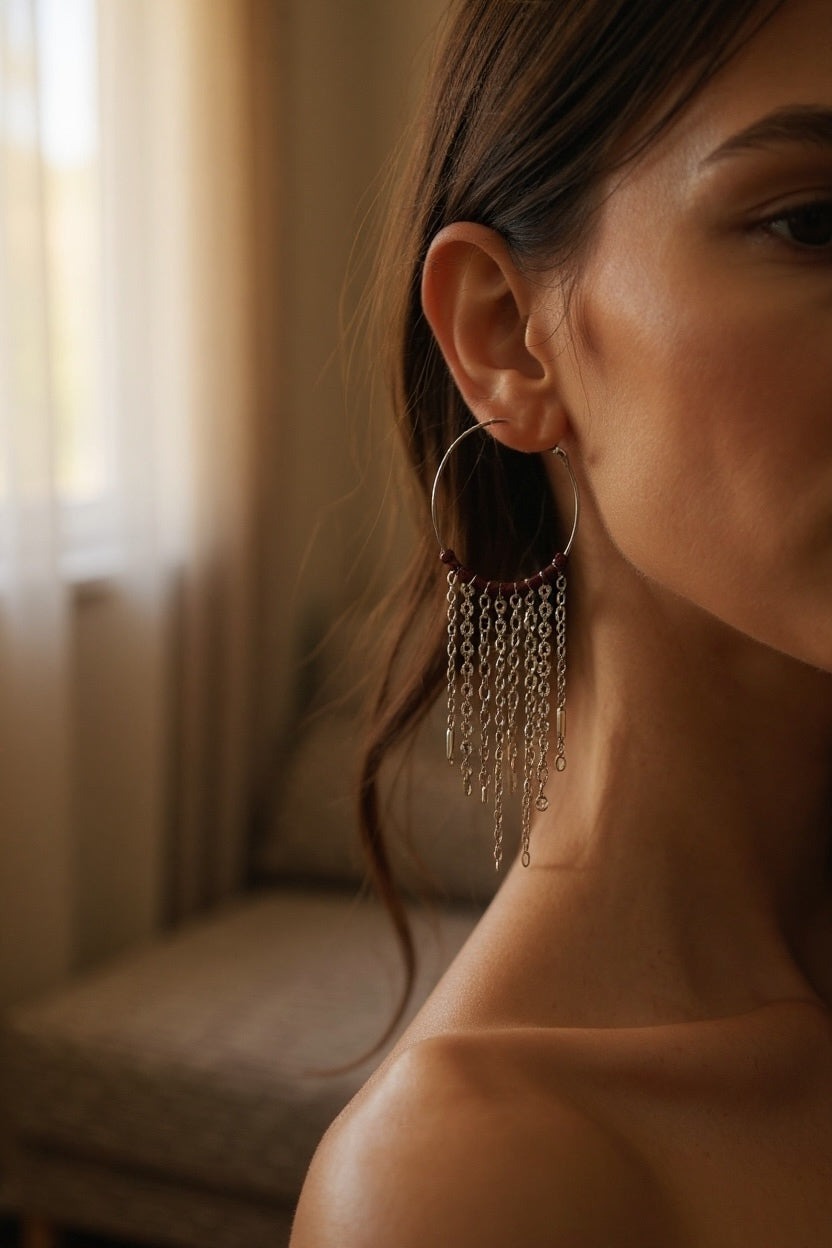 Mono orecchino in acciaio e granate