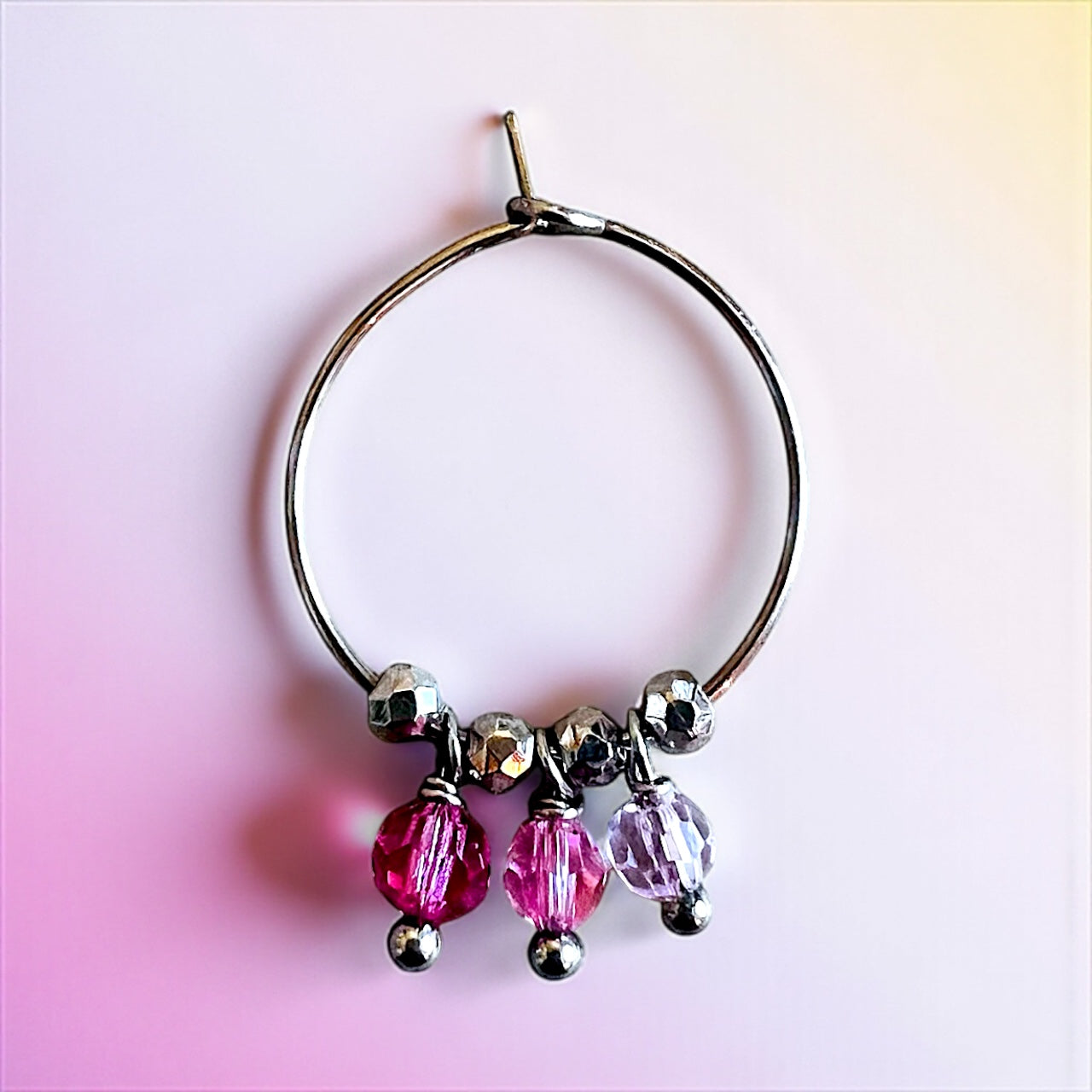 Mono orecchino in acciaio e cristalli