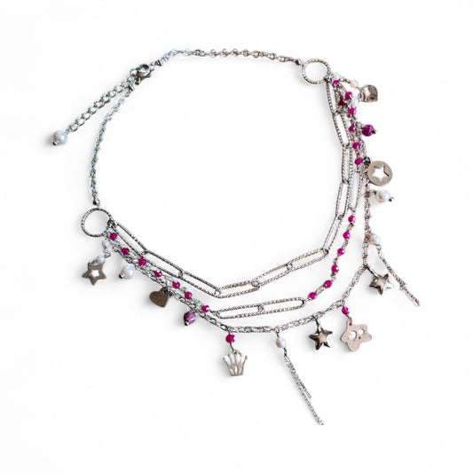 Girocollo triplo in acciaio con rubini lab e perle di conchiglia