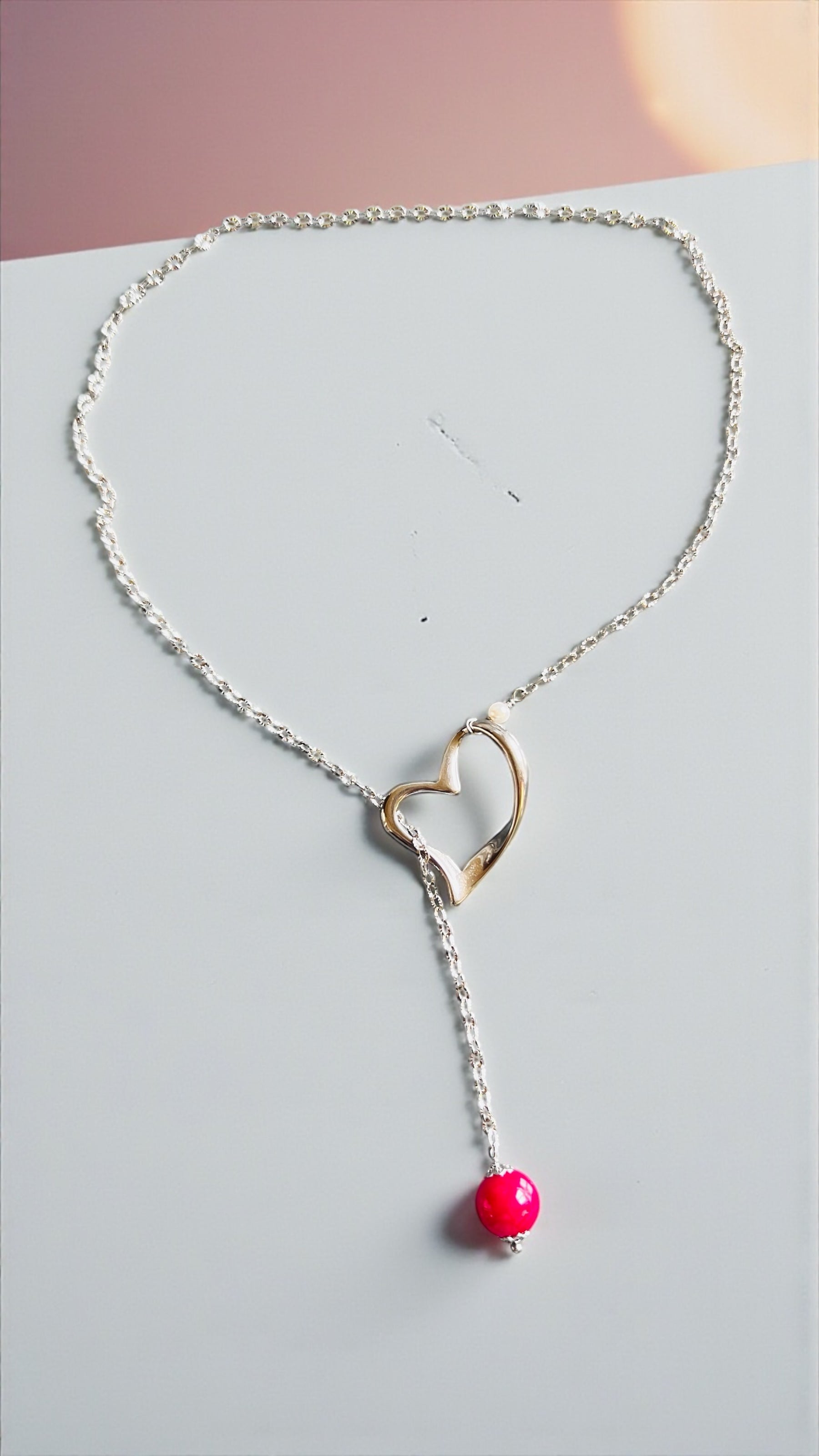 Collana sali-scendi Vizio in Paris in acciaio con rubino lab e perla di conchiglia