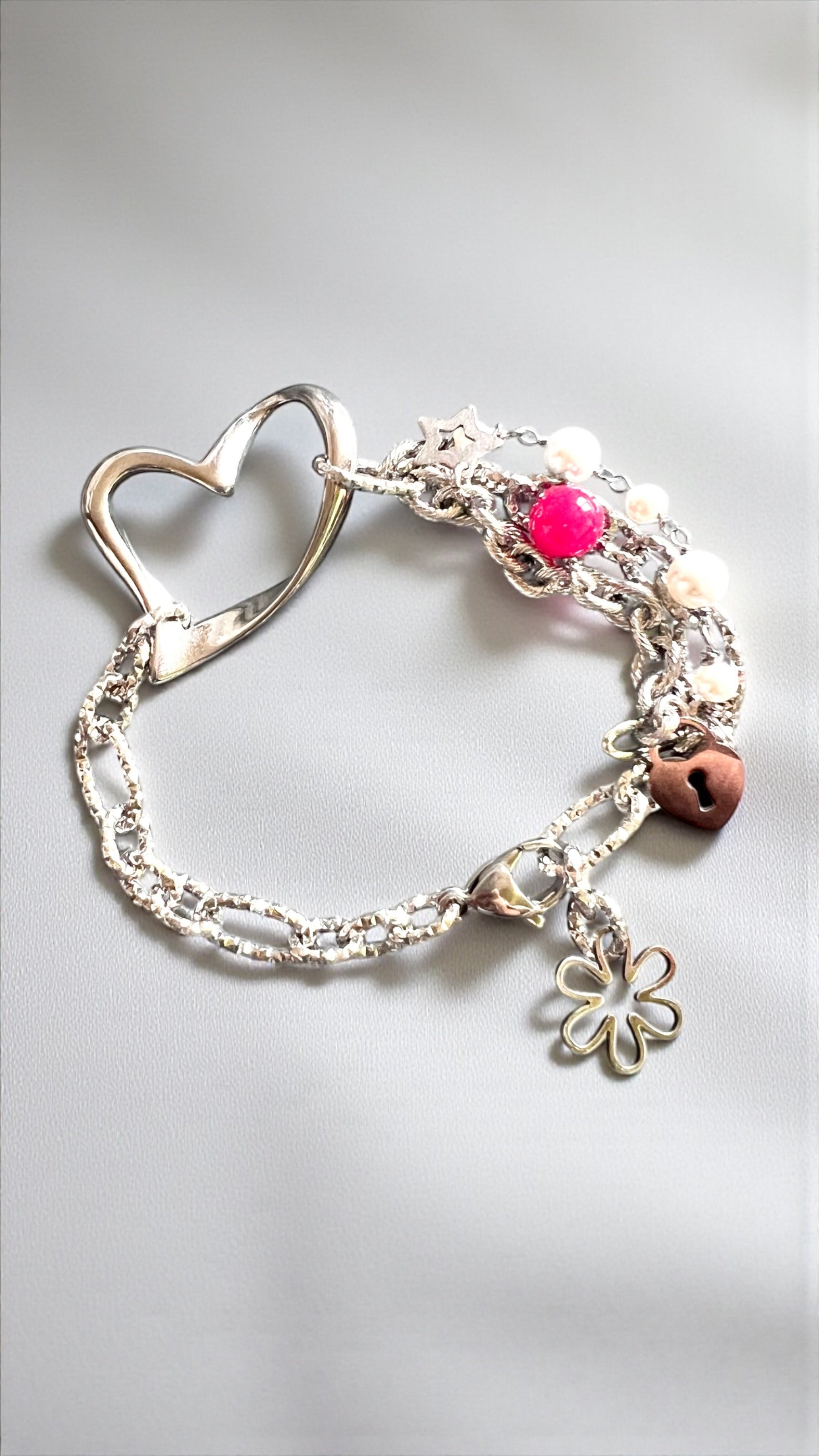 Bracciale acciaio rubino lab e perle di conchiglia