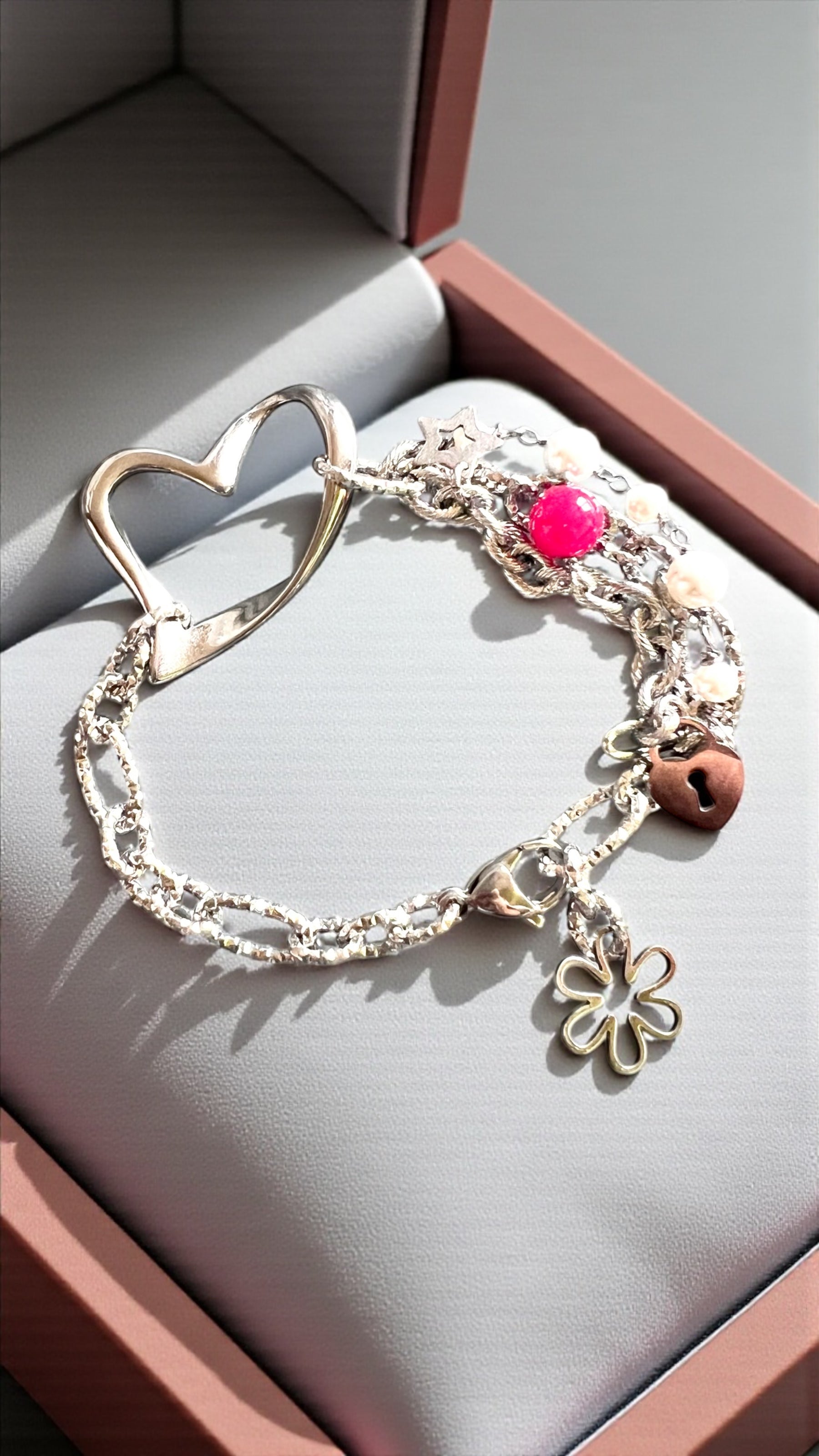 Bracciale acciaio rubino lab e perle di conchiglia