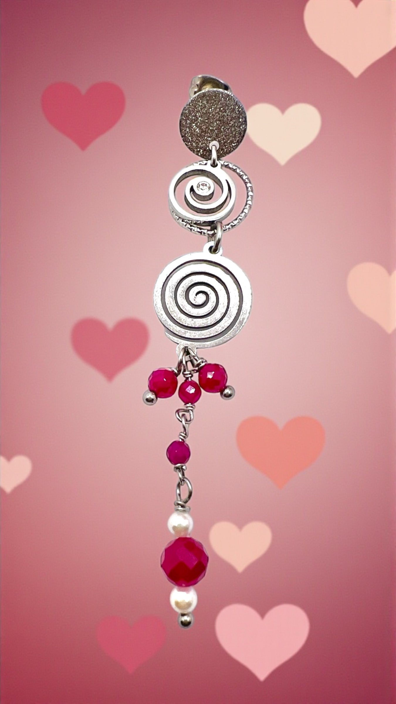 Mono orecchino Vortice in acciaio rubino lab, zircone e perla