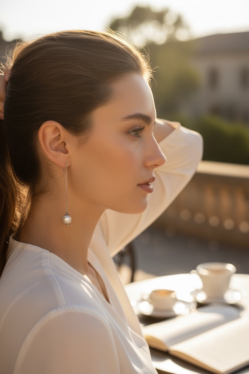 Mono orecchino a catenella acciaio e perla di conchiglia