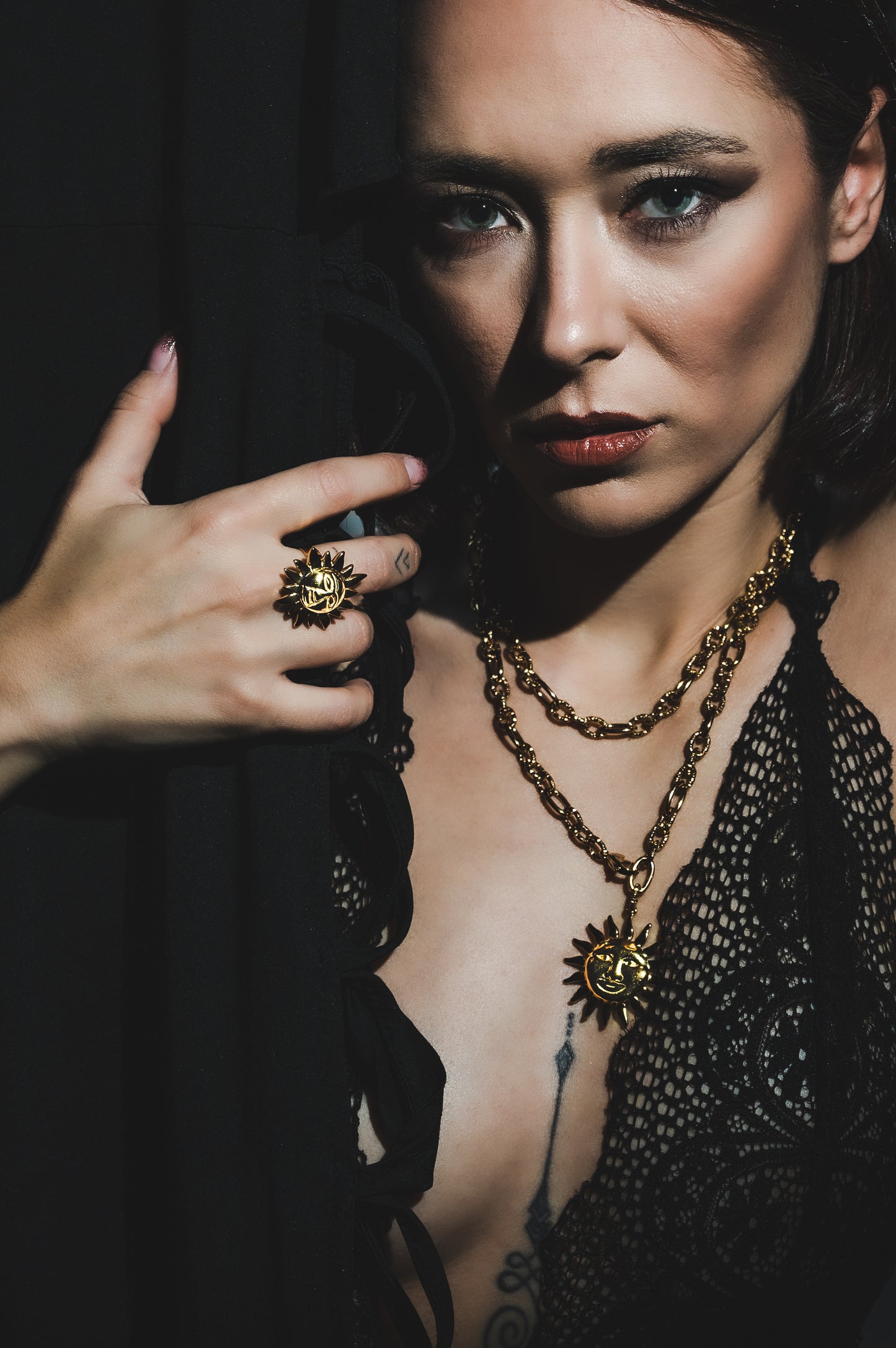 Collana in acciaio dorato Sole