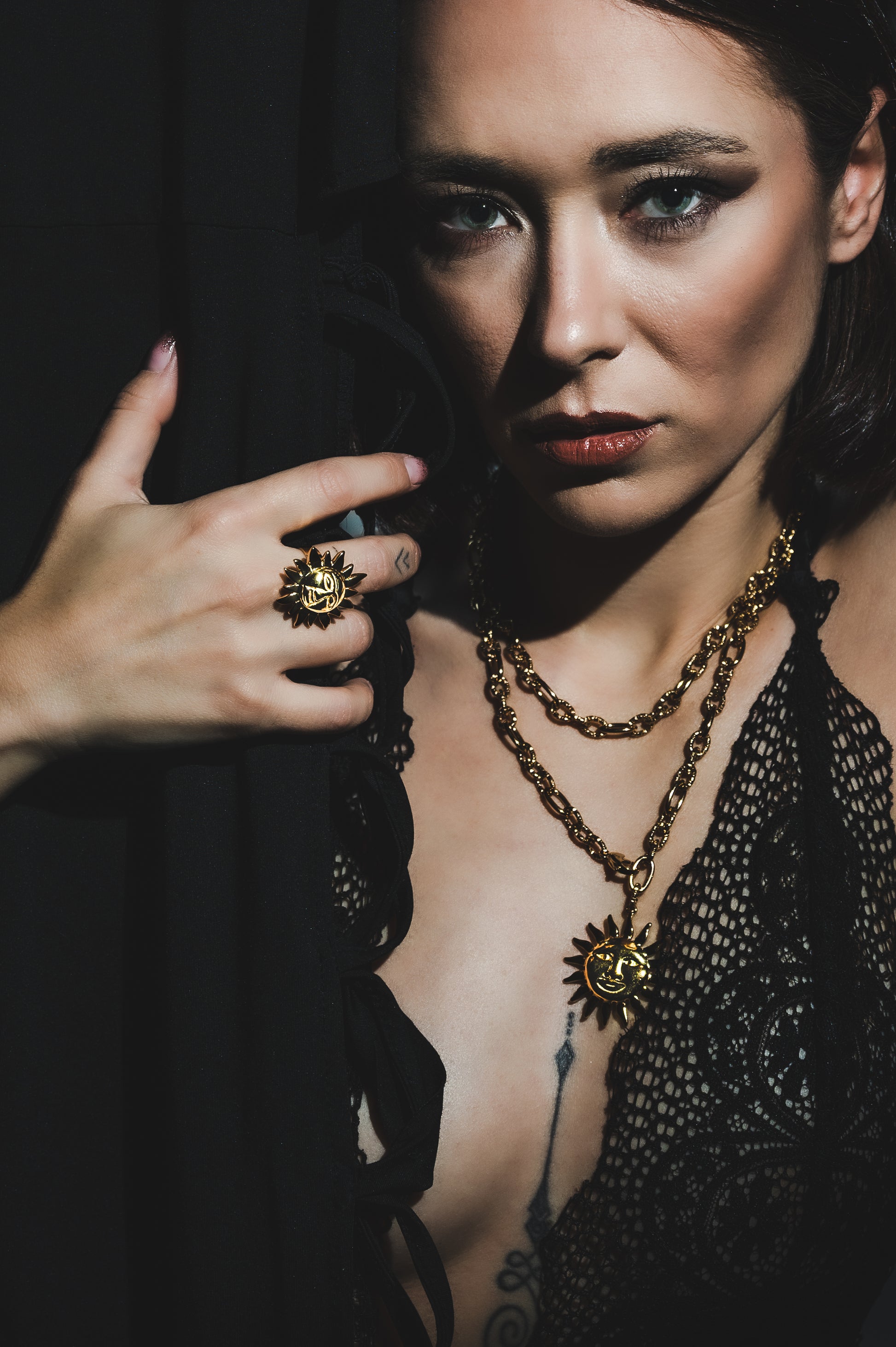 Collana in acciaio dorato Sole