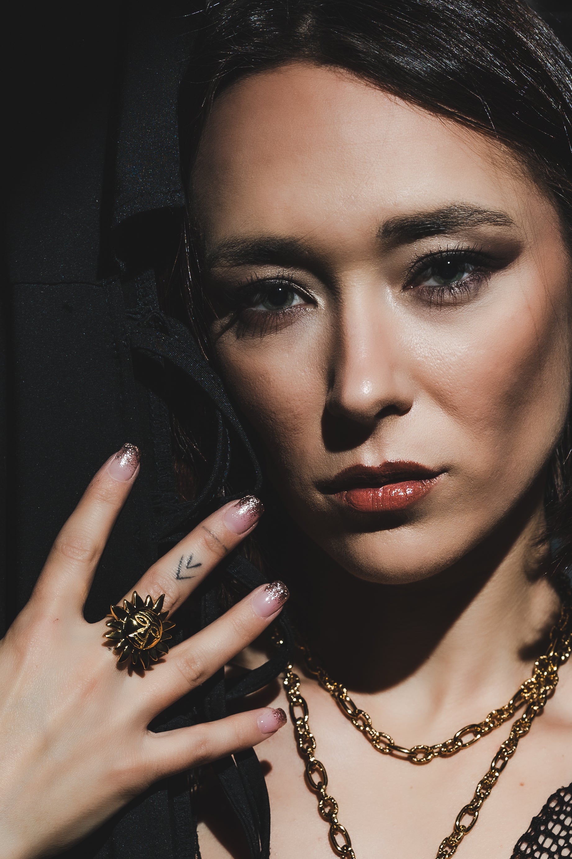 Collana in acciaio dorato Sole