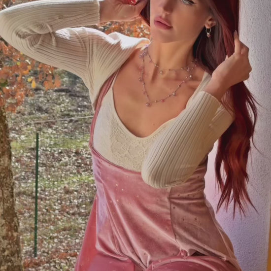 Collana trasversale in acciaio e cristalli indossata a bracciale; girocollo in acciaio cristalli Swarovski rosa e ciondolo in acciaio Corona  firmati Vizio Gioielli